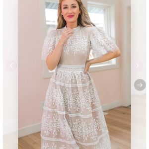Ivy City Co beautiful lace midi dress with butterfly sleeves. Bride wore once